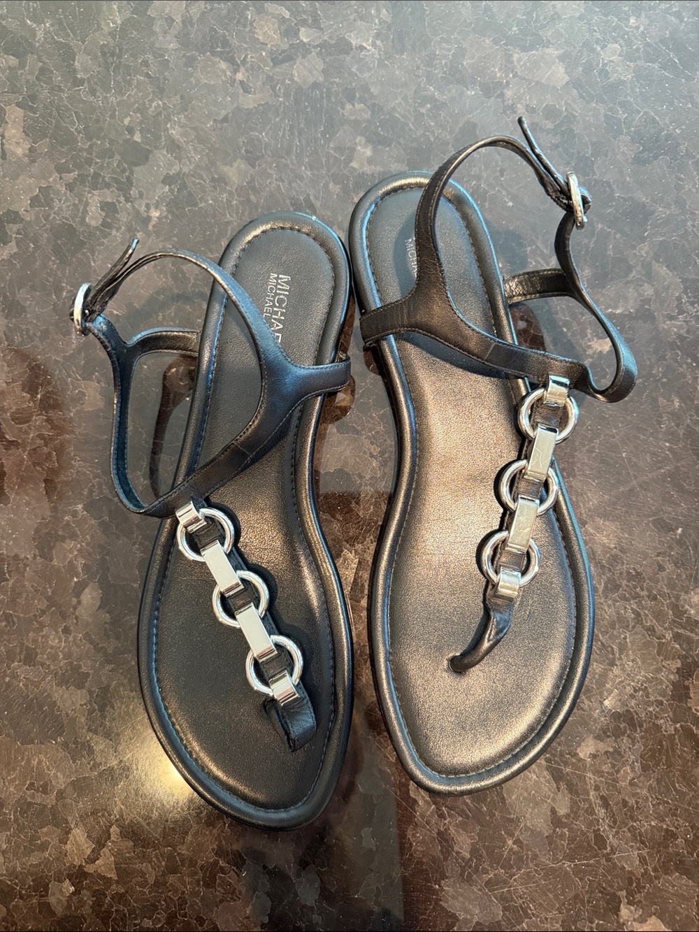 Michael Kors Black Leather T-Strap Sandals with Silver Chain Accents